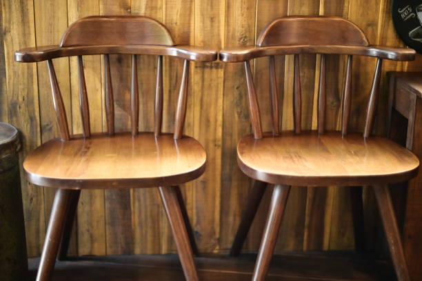 istock Wooden Dining Chairs in Natural Light 2165624807