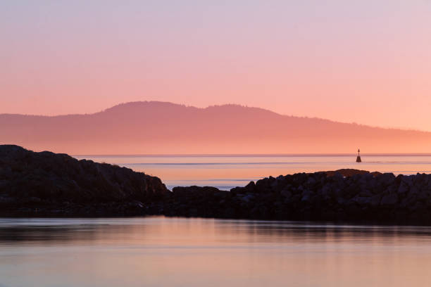 Sunrise viewed from the Oak Bay marina, located on southern Vancouver Island.
