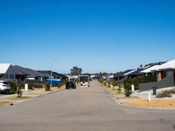 istock Moving van on street in new housing development 2165627167