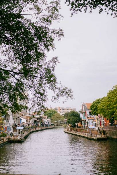 istock Melaka City River Side Canal View with Large Trees 2165630369