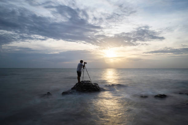 istock Nature photographer and sunset 2165631148