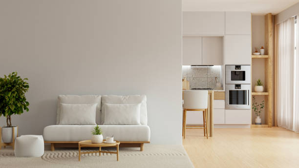 istock Modern living room seamlessly blends with the minimalist kitchen, creating an open and airy space filled with natural light- 3D rendering 2165631609