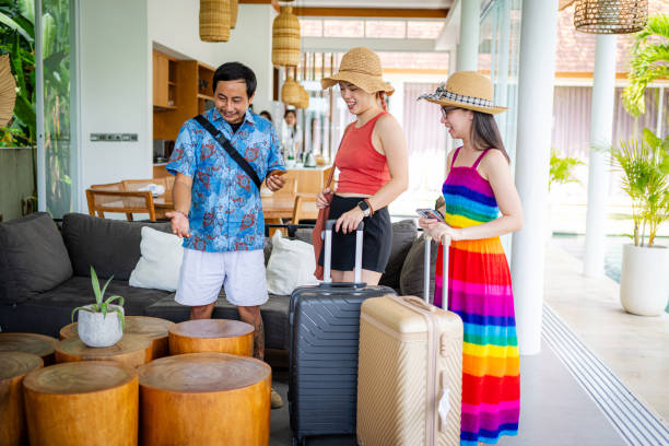 istock Guided Tour: Villa Facilities Explained to East Asian Tourists 2165632463