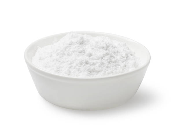 istock White ceramic plate full of powdered sugar, isolated on a white background 2165638433