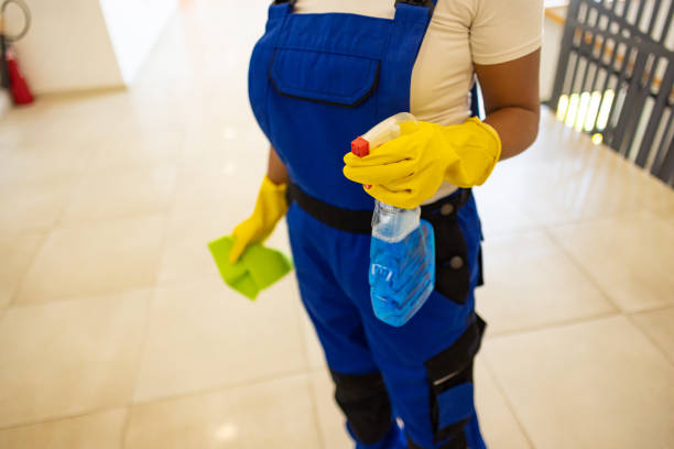 istock Female janitor cleaning the school building 2165641572