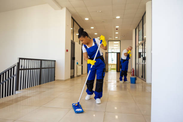 istock Janitors cleaning the  floor in school hallway 2165642889