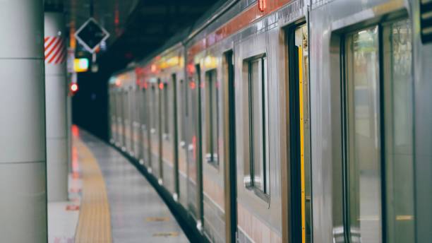 istock An empty railway platform with train waited to depart at Tokyo train station 2165643411
