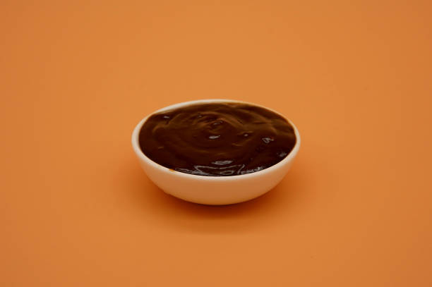 istock Smoky BBQ Sauce with Rich Flavor 2165643536
