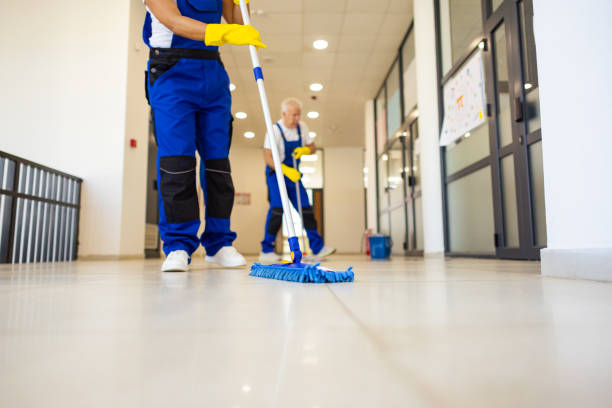 istock Janitors cleaning the  floor in school hallway 2165644001