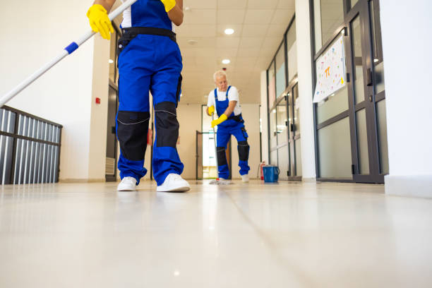 istock Janitors cleaning the  floor in school hallway 2165644277