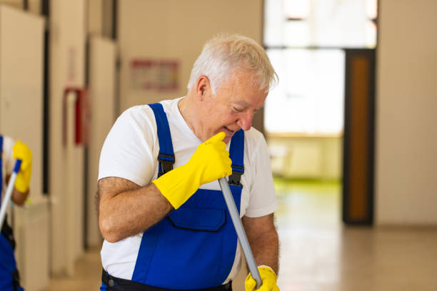 istock Janitors cleaning the  floor in school hallway 2165645655