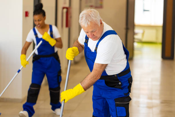 istock Janitors cleaning the  floor in school hallway 2165645771