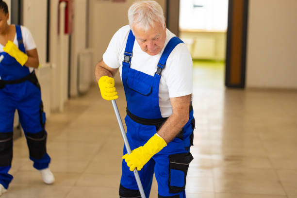 istock Janitors cleaning the  floor in school hallway 2165646103