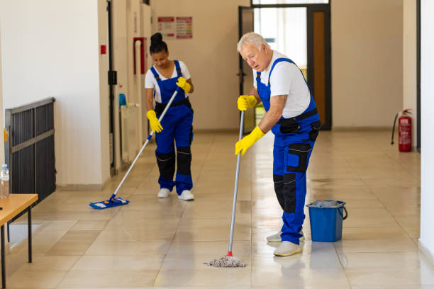 istock Janitors cleaning the  floor in school hallway 2165647679