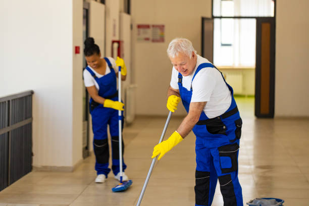 istock Hardworking Janitors cleaning the  floor in school hallway 2165649242