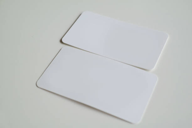 istock Blank business cards isolated on white background 2165649667