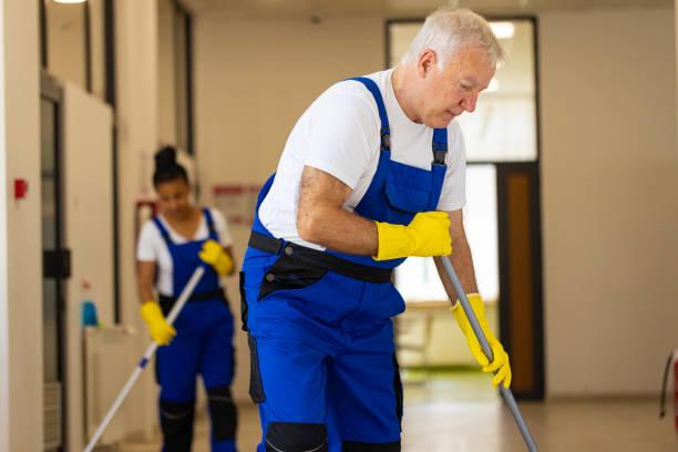 istock Hardworking Janitors cleaning the  floor in school hallway 2165650988