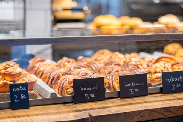 istock Swedish cinnamon and cardamom buns in bakery showcase 2165654689