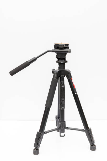 istock Black professional tripod for camera and smart phone isolated on white background 2165656593