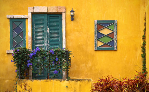 istock Yellow vintage facade and balcony background 2165657782