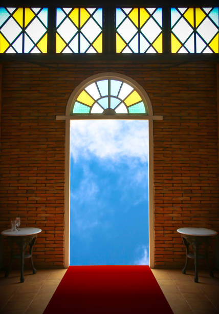 Retro door opened with old building wall, blue sky and cloudy outside, empty space for copy, architecture abstract design concept for background.