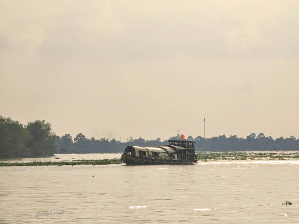 istock boat trip on Co Chien river 2165659649