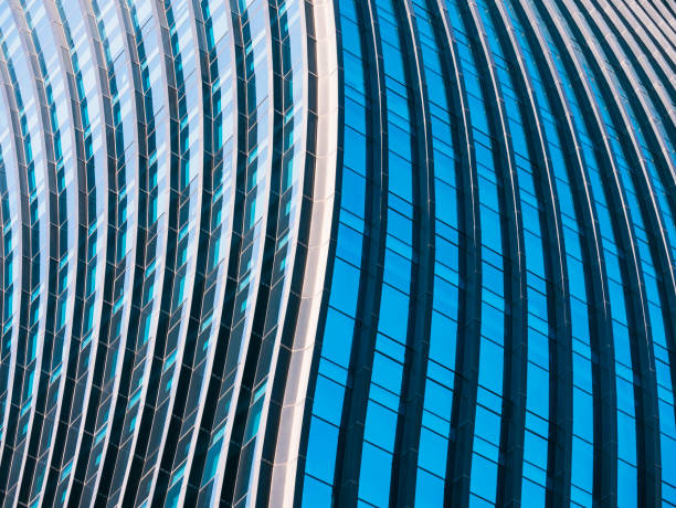 istock Glass wall curve Architecture details Modern building Exterior 2165663530