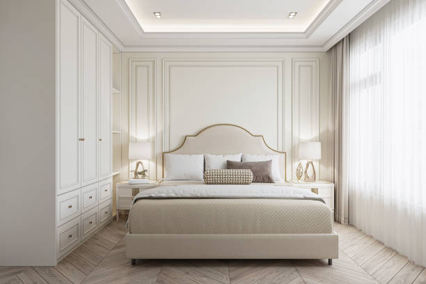 istock Bright bedroom interior with a white wall, built-in arch, and a sleek, comfortable bed. 2165670738
