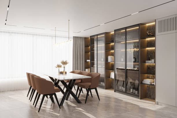 istock bright and spacious dining room with a large window and comfortable seating. 2165671391