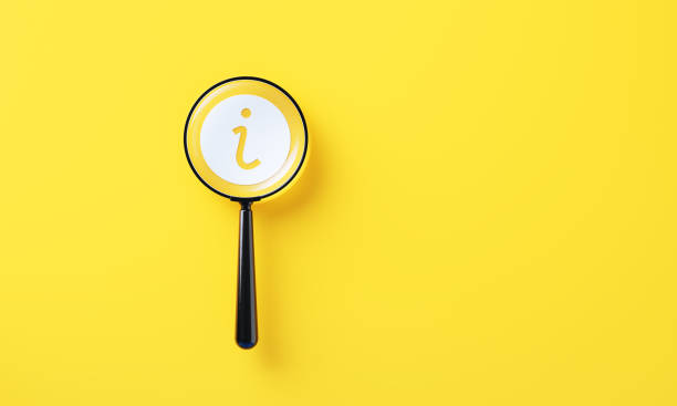 Black Magnifier And White Info Symbol On Yellow Background