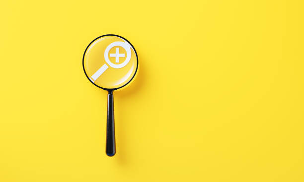 istock Black Magnifier And White Magnification Symbol On Yellow Background 2165679718