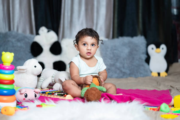 Baby Playing with Toys in Cozy Indoor Setting