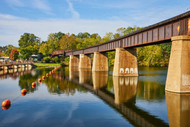 istock Rustic Railway Bridge Over Huron River with Buoys, Michigan 2165686542