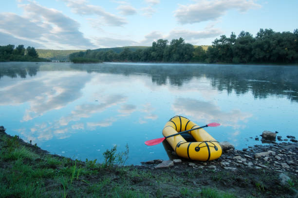 istock Yellow packraft rubber boat with red padle 2165687439