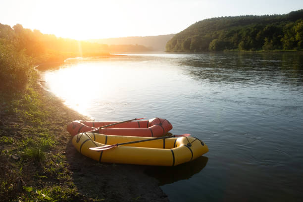 istock Orange and yellow packrafts rubber boats 2165689163