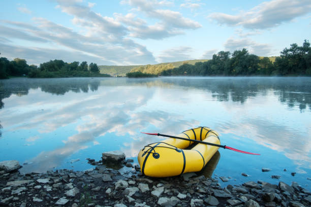 istock Yellow packraft boat on sunrise river Dnister 2165691964