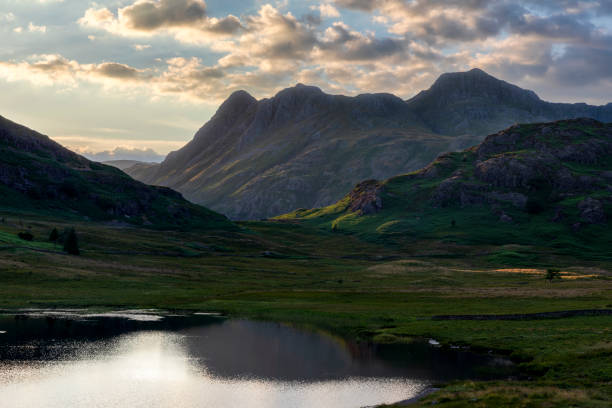 blea tarn lake district and the langdale pikes at sunset no people