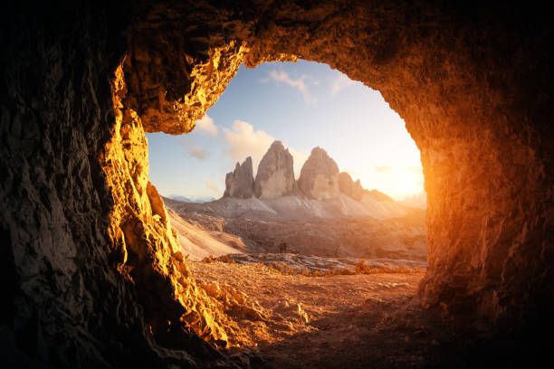 istock View from the cave in mountain against Three peaks of Lavaredo 2165692021