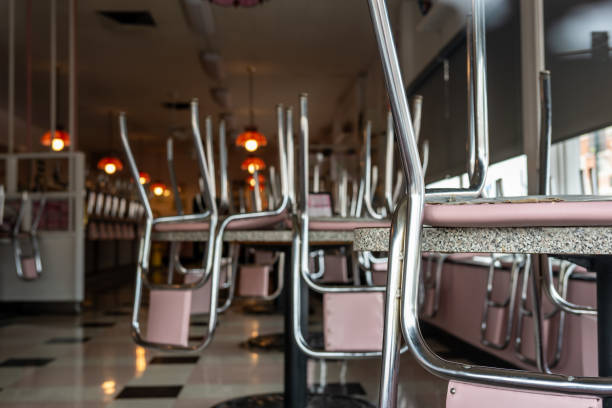 Old fashioned dinner closed after hours with chairs up on tables. High quality photo