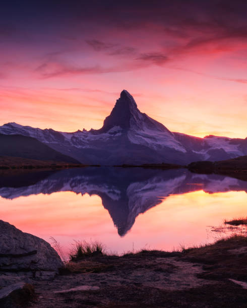 istock Matterhorn peak on Stellisee lake 2165695701