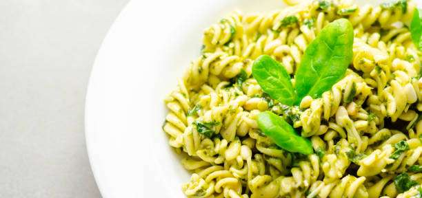 istock A plate of pasta with spinach on top 2165696847