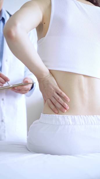istock Doctor and patient. Physician is making notes on a clipboard while patient woman is describing something. Pediatrician, medicine concept 2165700268