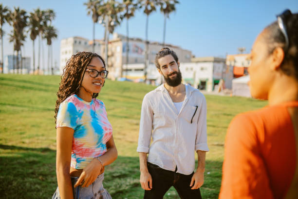 istock Young people hanging out together in Venice, CA 2165707528