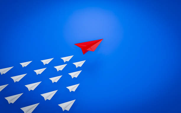 istock Leadership concept, red leader plane leading white plane on blue background or sky. flying paper planes for business concept. 3D Rendering 2165716683