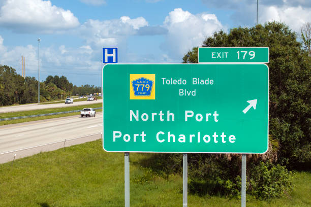 istock American freeway exit sign in Florida. I-75 highway junction with direction to North Port and Port Charlotte 2165717869