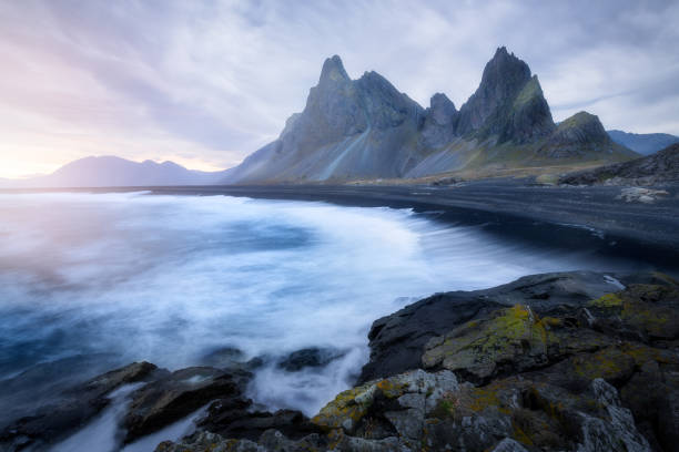 istock Dramatic sunset before a storm at Eystrahorn, in Iceland 2165719226