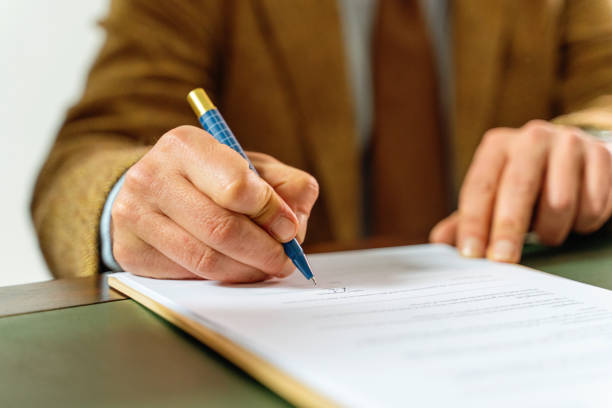 istock Businessman Signing Contract - Corporate Agreement and Professional Document Signing 2165721507