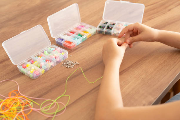 istock Making Jewelry With Beads 2165722495