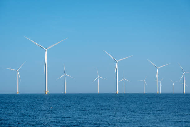 istock Majestic Windmill Park Dancing Above Tranquil Waters in the Netherlands 2165724369