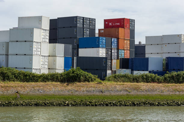 Netherlands Rotterdam July 9, 2024 - Cargo terminal at the freight and industrial port of Rotterdam. Many stacked different containers, waiting for onward transport.